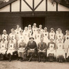 Members of the Chipstead British Red Cross outside the Red Cross Hut (now the Scout Hut), 1940
