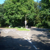 The crossroads at the junction of Coulsdon Lane with Portnalls Road.  Also the 	boundary between the